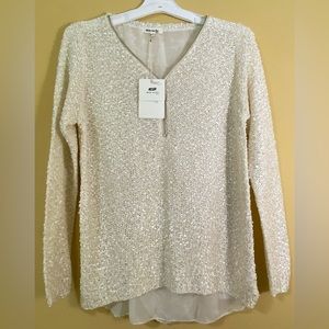 NEW with tag , Elegant and unique Woman’s sweater in color Cream in size M